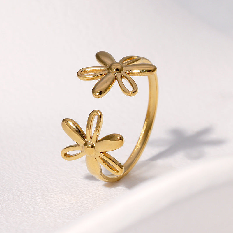 Anillo dorado margarita para mujer – diseño delicado de flor en acero inoxidable