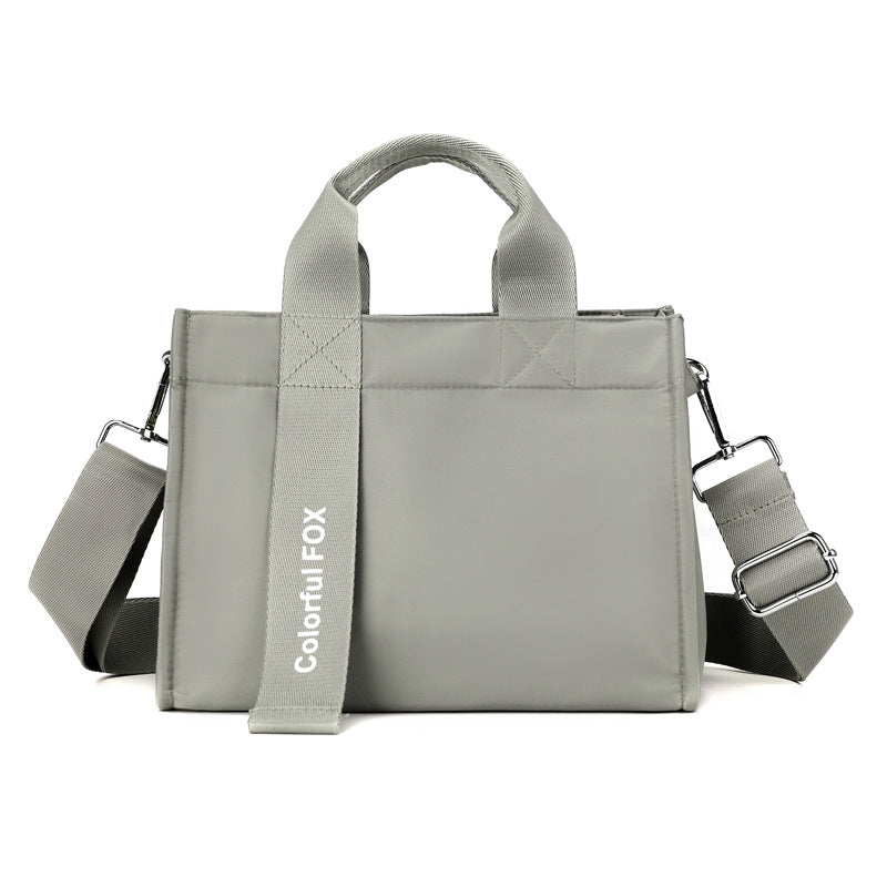 Bolsa gris Holybook – estilo minimalista, ideal como bolso de oficina