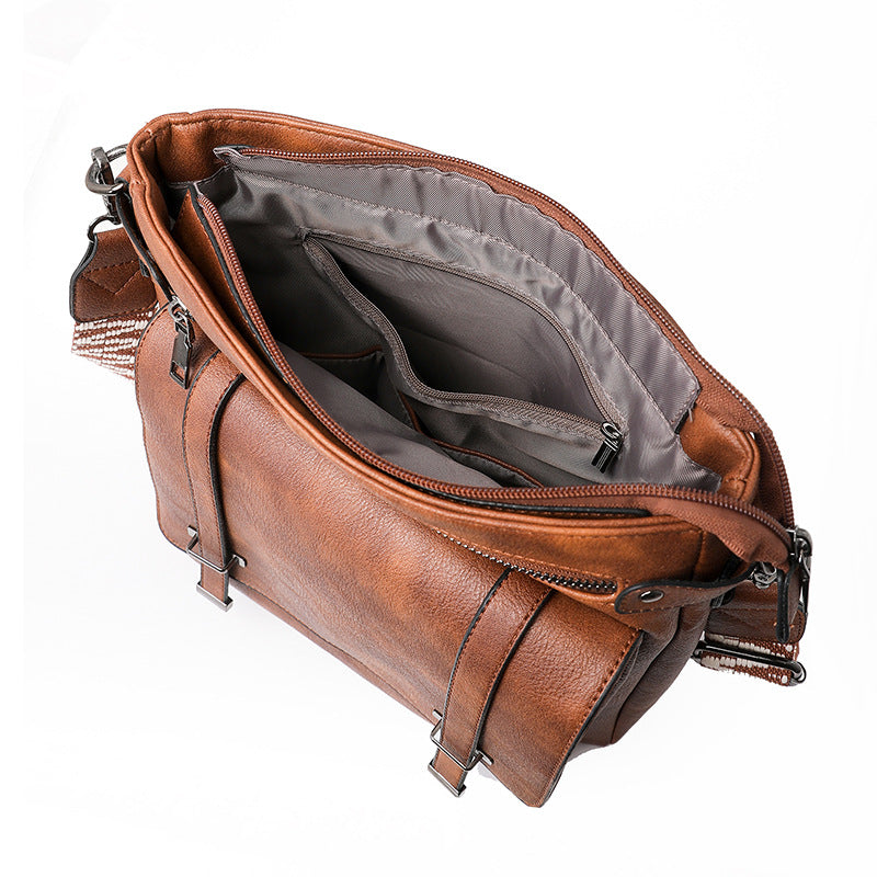 Interior espacioso de la bolsa Holybook – incluye compartimentos separados