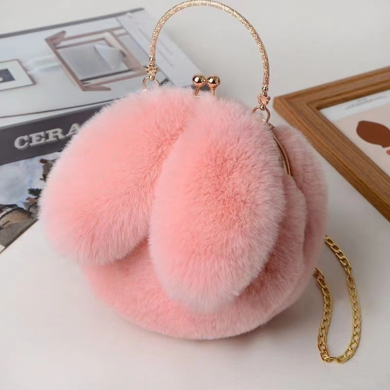 Bolso de peluche rosa brillante con orejitas – diseño llamativo y divertido