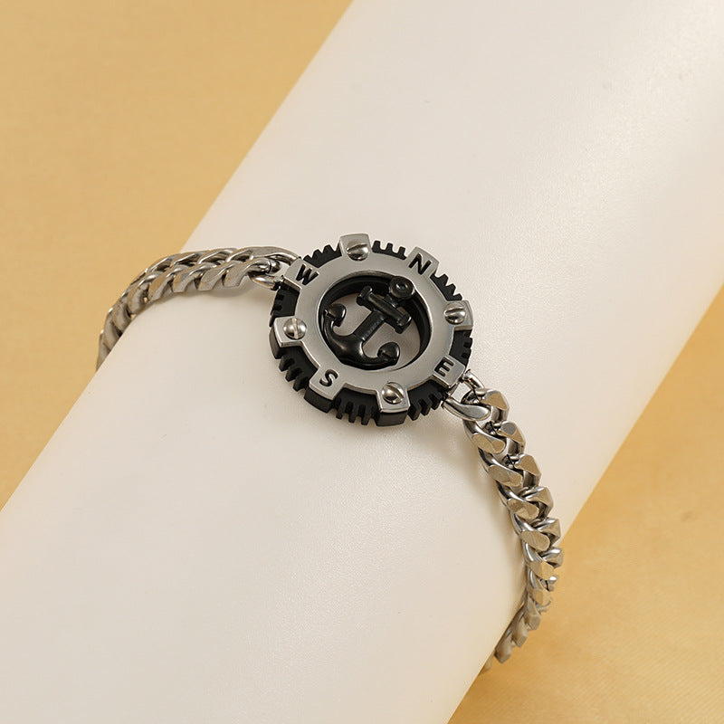 Pulsera con dije de ancla y placa redonda – accesorio moderno para hombre y mujer