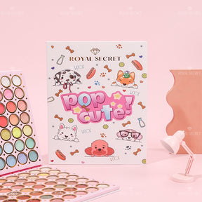 swatches de sombras de ojos de la paleta de 126 colores aplicados sobre el brazo en líneas ordenadas
